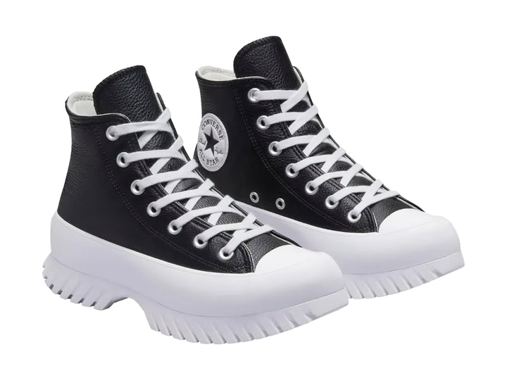 Tenis Converse Chuck Taylor All Star Lugged 2.0 Hi en color negro con suela blanca de plataforma dentada.