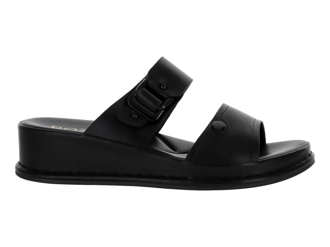 Sandalias negras de plataforma para niña con correa ajustable y hebilla.