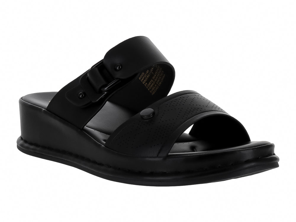 Sandalias negras de plataforma para niña con correa ajustable y hebilla.