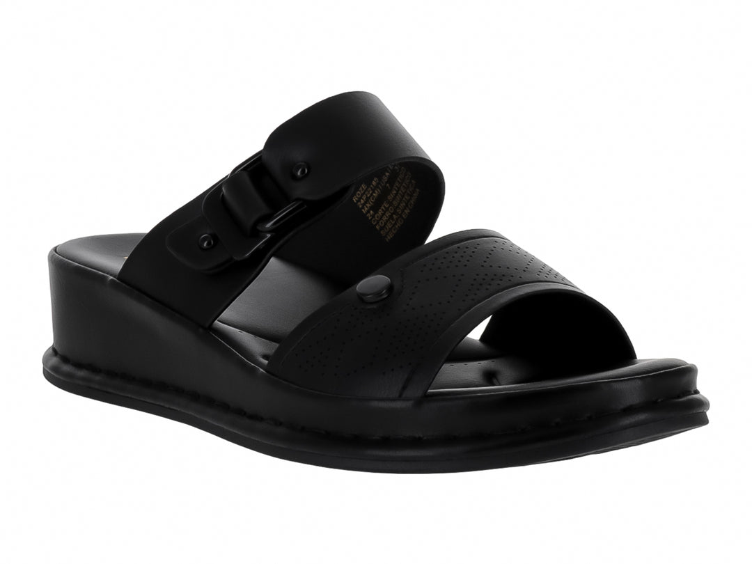 Sandalias negras de plataforma para niña con correa ajustable y hebilla.