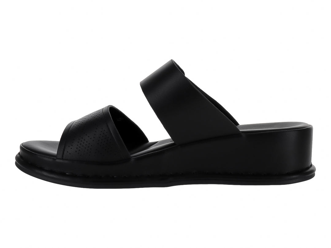 Sandalias negras de plataforma para niña con correa ajustable y hebilla.