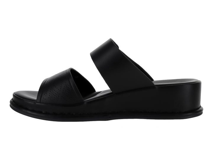 Sandalias negras de plataforma para niña con correa ajustable y hebilla.