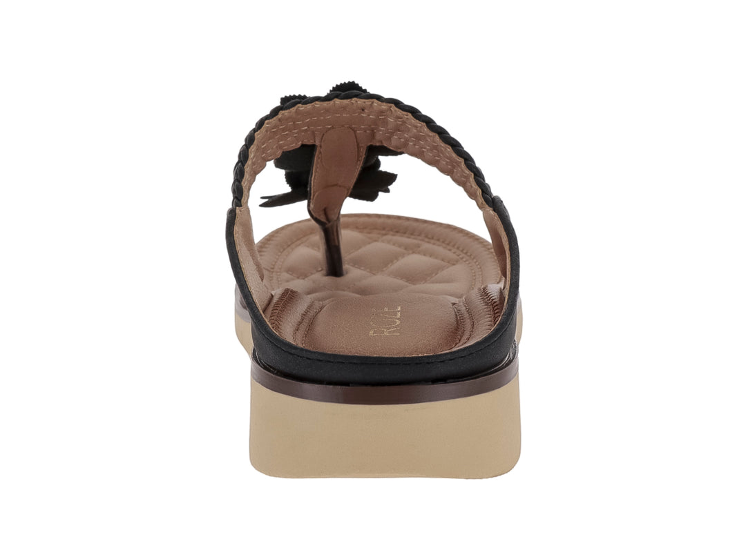 Sandalia negra y beige con tira trenzada, adornos florales y suela acolchada.