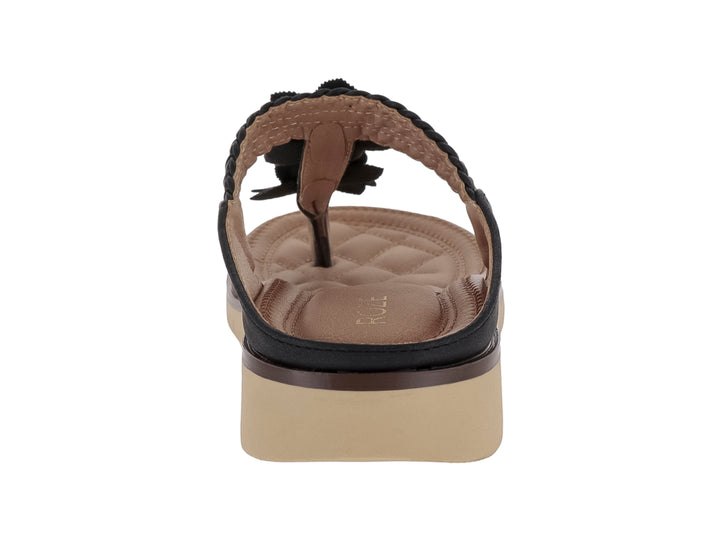 Sandalia negra y beige con tira trenzada, adornos florales y suela acolchada.