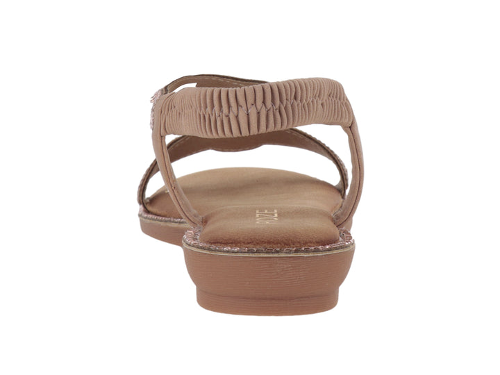Sandalia plana color rose gold con detalles brillantes y correa al tobillo.