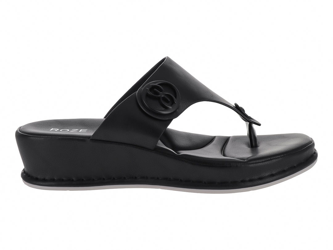 Sandalias negras de plataforma marca ROZE con diseño de tira en T y detalle circular en la parte superior.