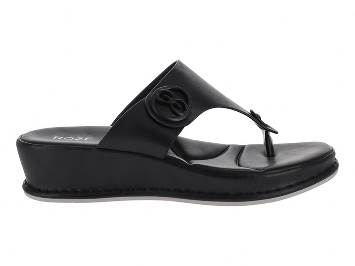 Sandalias negras de plataforma marca ROZE con diseño de tira en T y detalle circular en la parte superior.