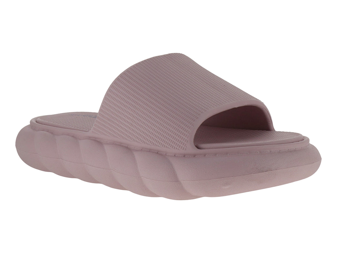 Sandalia slide de color nude con suela gruesa y diseño esculpido.