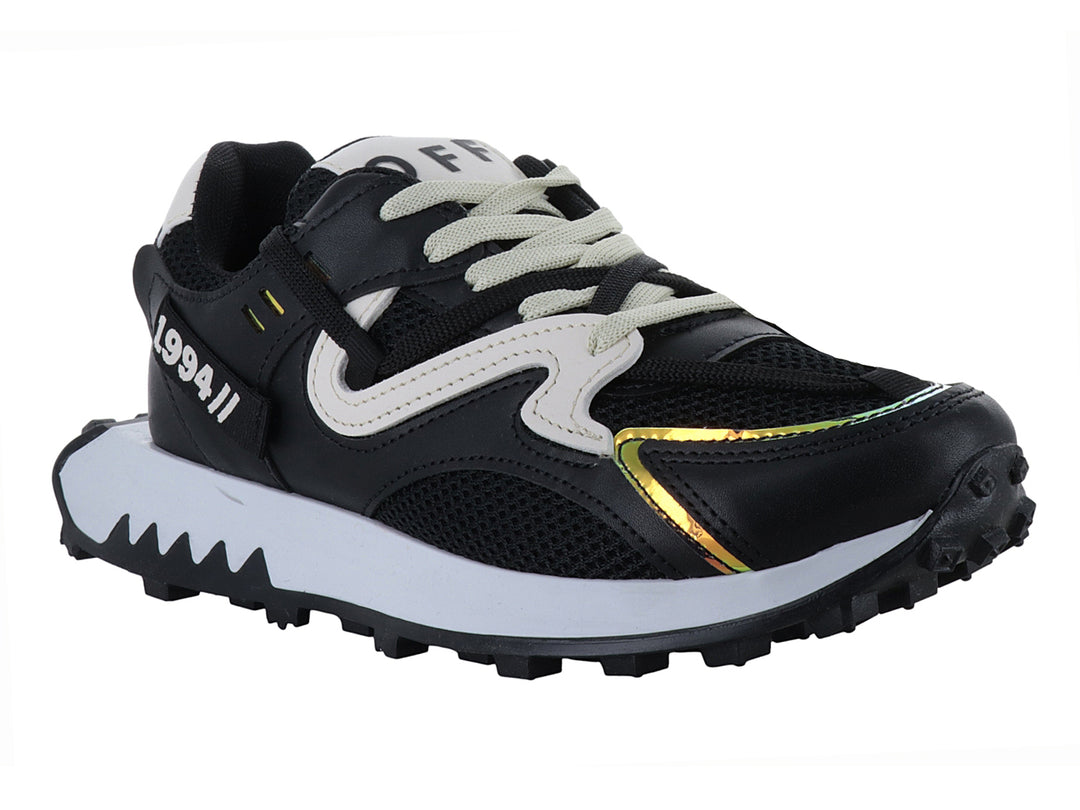 Tenis deportivos Ten Colours en color negro y blanco con detalles dorados y suela blanca dentada.