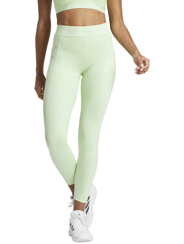 Leggings deportivos Adidas color verde claro semi green spark, corte 7/8 y ajuste ceñido para mujer.