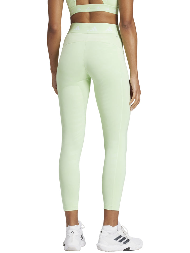 Leggings deportivos Adidas color verde claro semi green spark, corte 7/8 y ajuste ceñido para mujer.