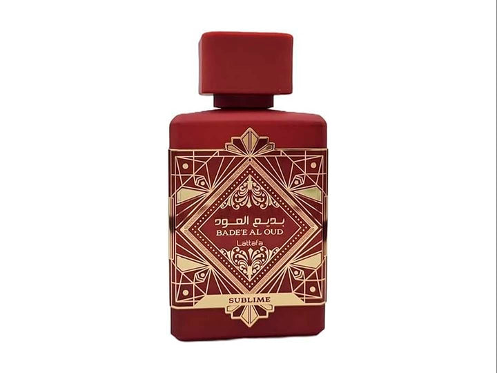 Perfume Lattafa Bade Al Oud Sublime en botella y caja color guinda con detalles ornamentales en dorado.