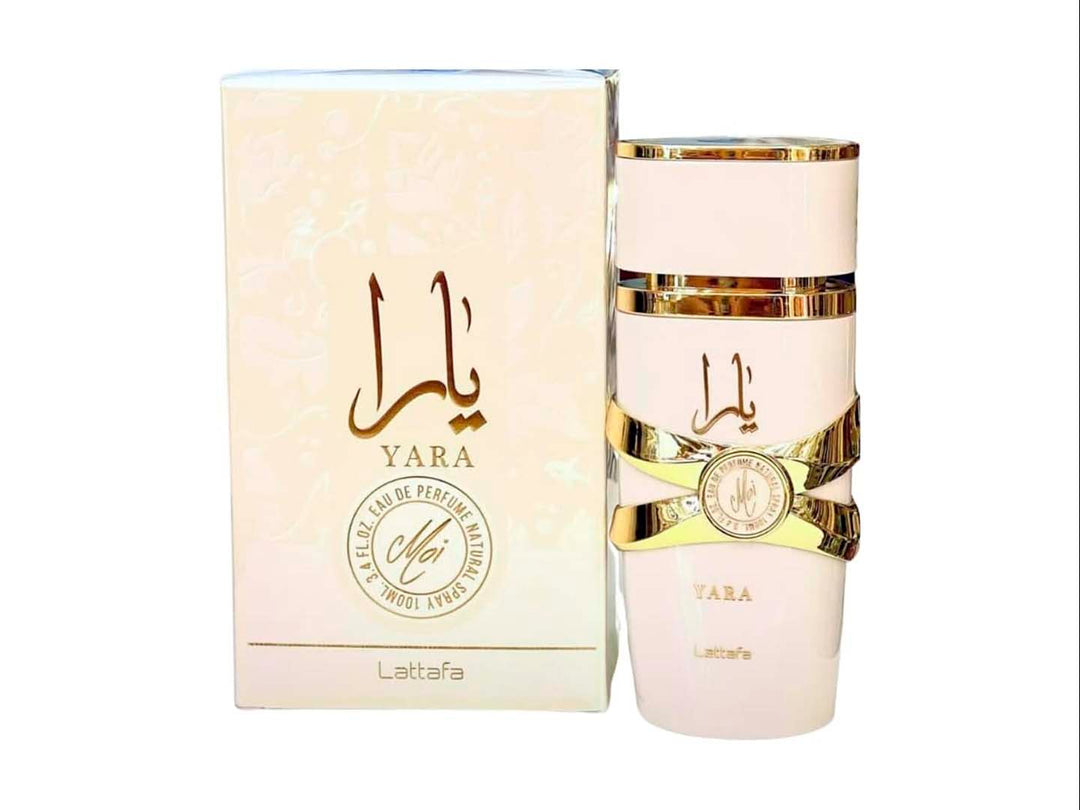 Perfume Lattafa Yara Moi en frasco blanco con detalles dorados y su caja blanca coordinada.