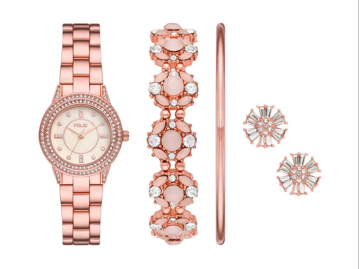 Set de joyería Folio en color oro rosa que incluye reloj, pulsera, brazalete y aretes con detalles brillantes.
