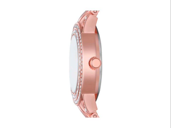 Set de joyería Folio en color oro rosa que incluye reloj, pulsera, brazalete y aretes con detalles brillantes.