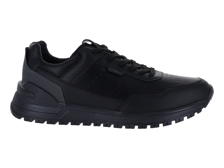 Zapato casual Clasben Bangla Desh en color negro monocromo con suela texturizada y agujetas.