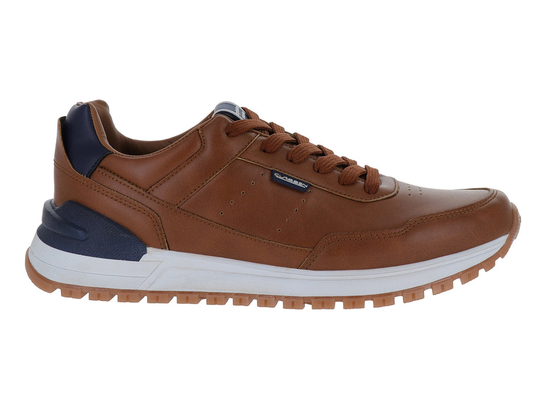 Zapato casual color camel con detalles en azul marino y suela blanca para niño.