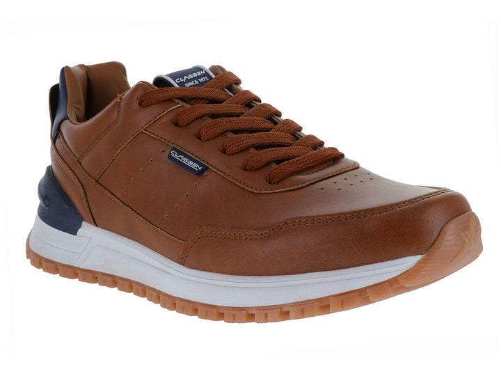 Zapato casual color camel con detalles en azul marino y suela blanca para niño.