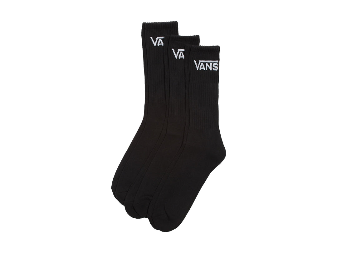 Pack de tres pares de calcetines negros de caña alta marca Vans con logotipo blanco.