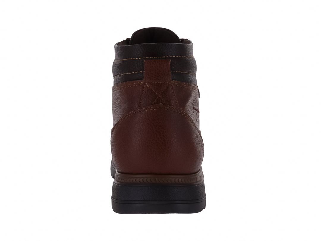 Bota casual color marrón miel con cordones y suela negra.