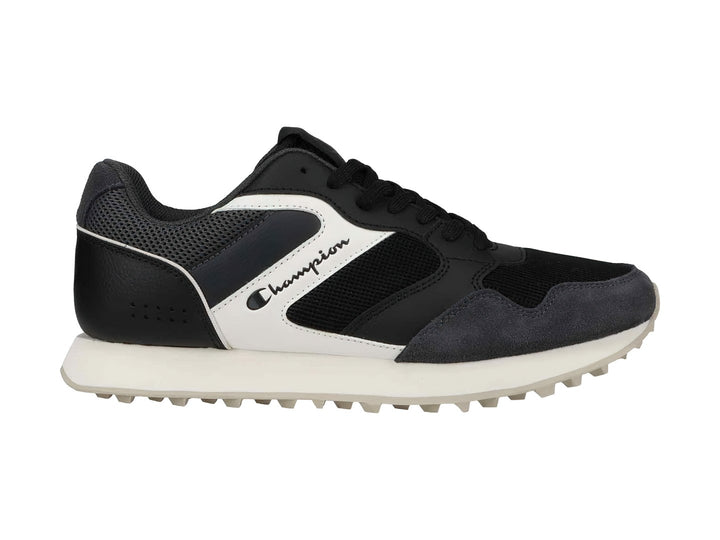 Tenis deportivos Champion en colores negro y gris con suela blanca y detalles laterales en blanco.