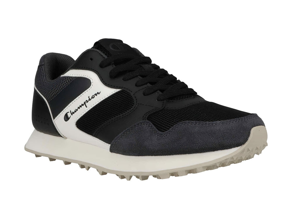 Tenis deportivos Champion en colores negro y gris con suela blanca y detalles laterales en blanco.