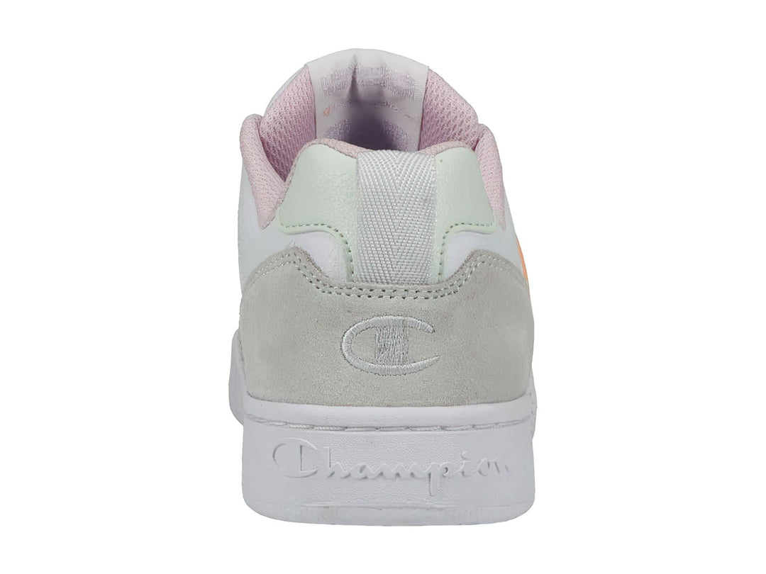 Tenis Champion blancos con detalles en gris y tonos pastel, diseño de corte bajo.