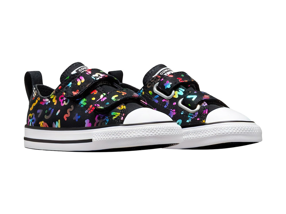 Tenis Converse negros con figuras multicolores, suela blanca y cierres de velcro para público Unisex.