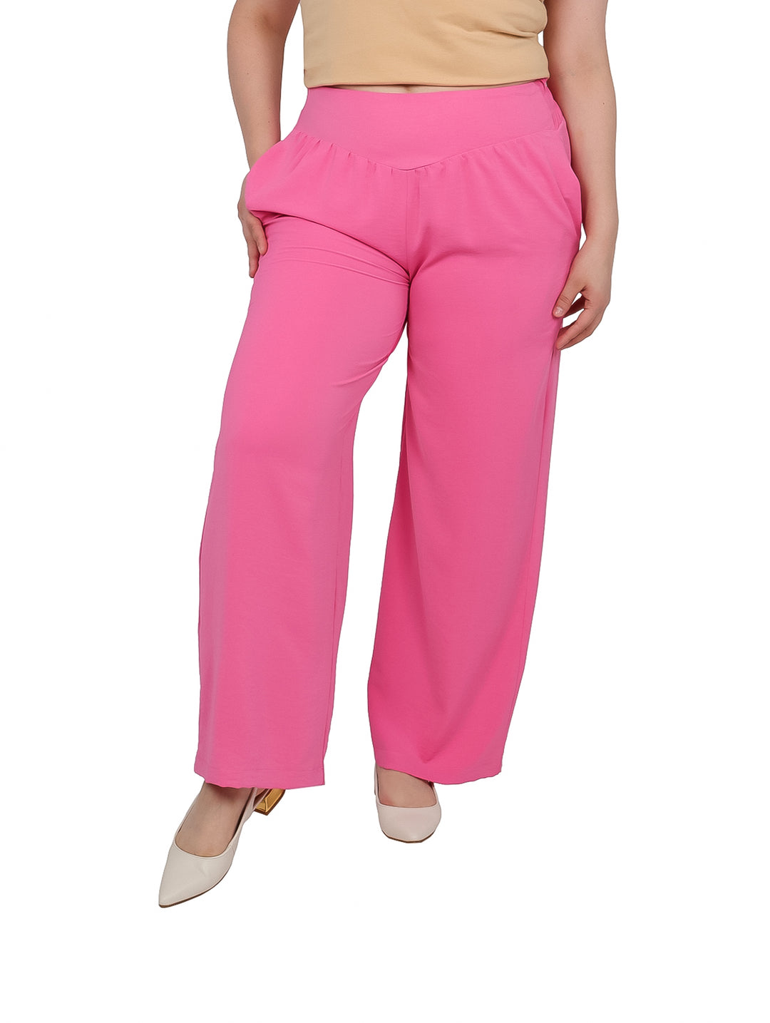 Pantalón ancho de maternidad en color rosa vibrante con cintura alta.