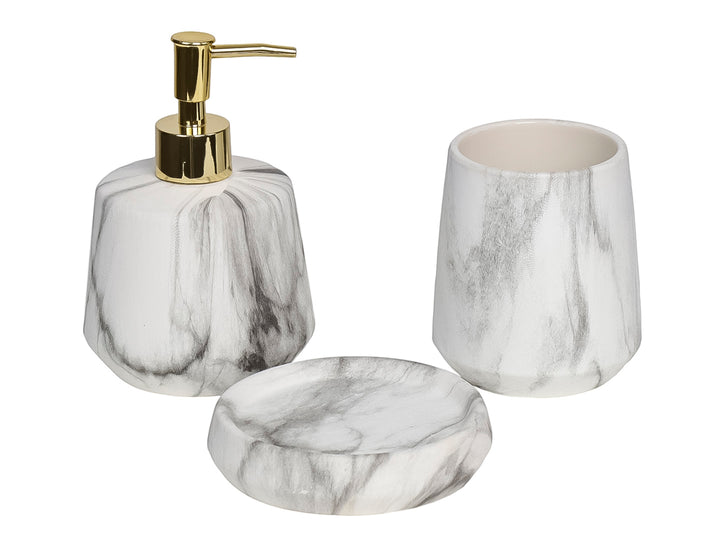 Set de accesorios para baño de cerámica con diseño de mármol blanco y negro y detalles dorados.