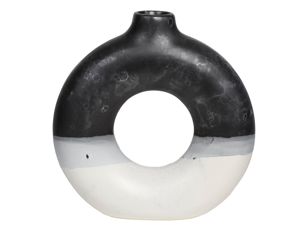 Florero de cerámica circular en colores blanco y negro con acabado mate y diseño moderno.