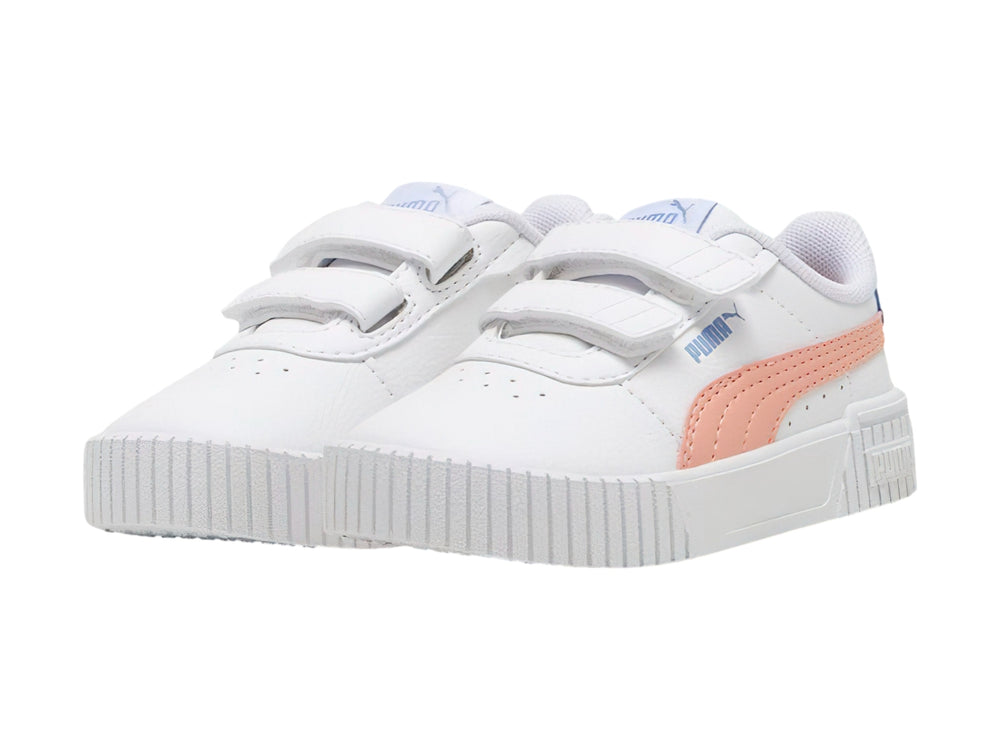 Tenis PUMA blancos para niña con detalles en rosa y azul y cierre de velcro.