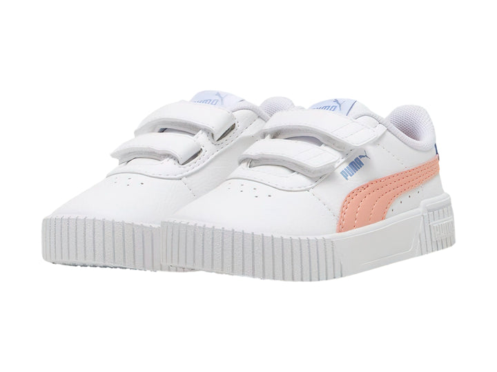 Tenis PUMA blancos para niña con detalles en rosa y azul y cierre de velcro.