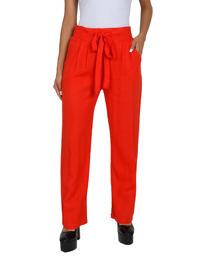 Pantalón de lino color naranja con pinzas y jareta en la cintura para mujer.