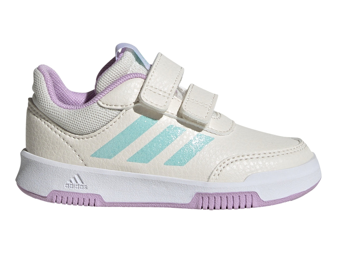 Tenis deportivos Adidas blancos con rayas azul claro, cierre de velcro y detalles en morado.