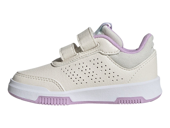Tenis deportivos Adidas blancos con rayas azul claro, cierre de velcro y detalles en morado.