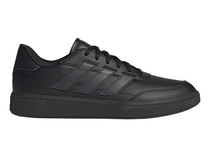 Tenis Adidas Courtblock de color negro, diseño deportivo de corte bajo con cordones.
