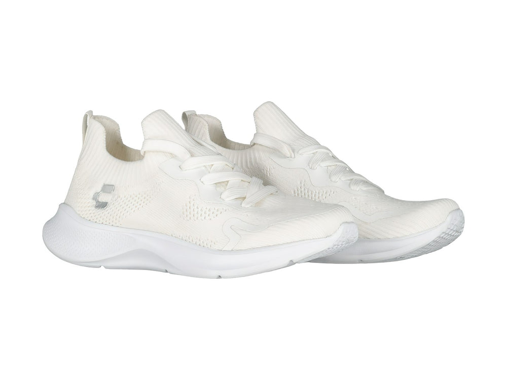Tenis deportivos Charly color blanco con parte superior tejida y suela blanca.