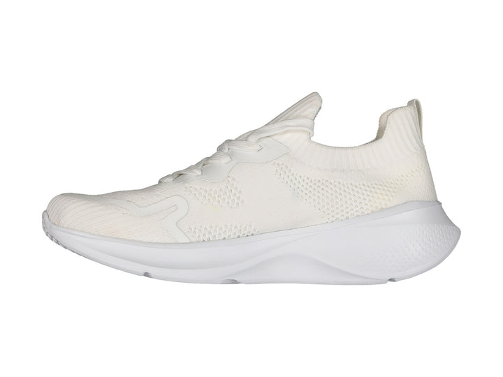 Tenis deportivos Charly color blanco con parte superior tejida y suela blanca.