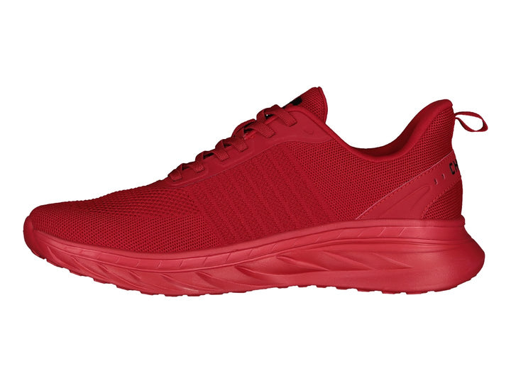 Tenis deportivos marca Charly en color rojo sólido con suela a juego y tejido transpirable.