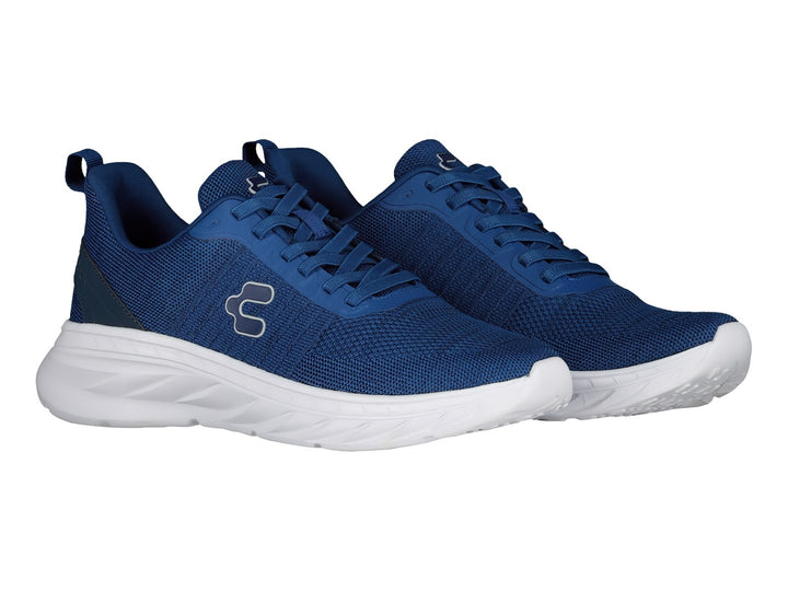 Tenis deportivos Charly en color azul marino con suela blanca y agujetas coordinadas.