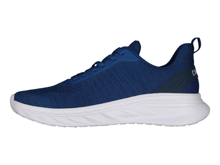 Tenis deportivos Charly en color azul marino con suela blanca y agujetas coordinadas.
