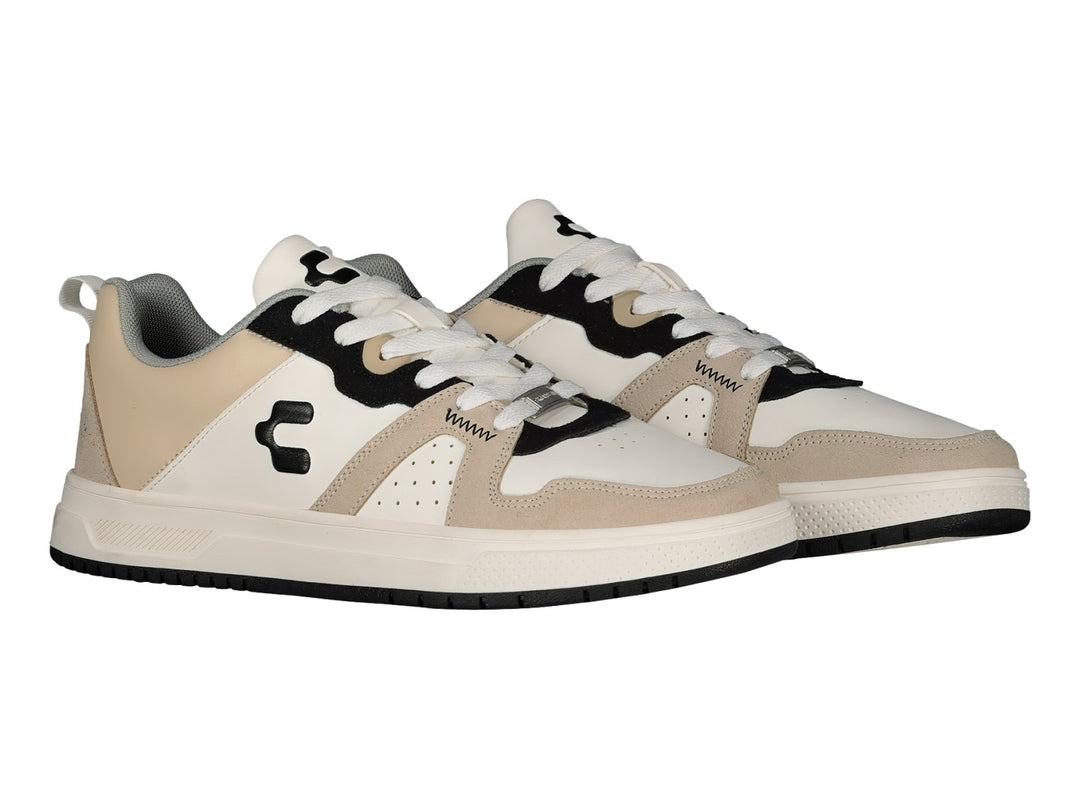 Tenis deportivos Charly en colores blanco, beige y negro con suela blanca y cordones.