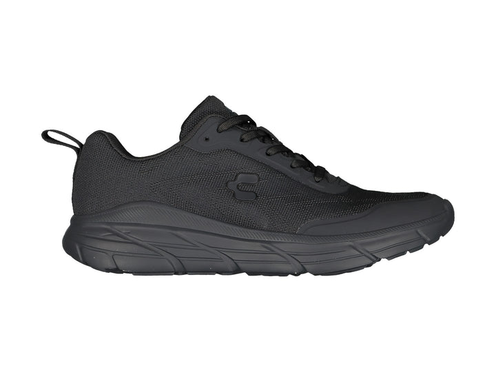 Tenis deportivos Charly en color negro con suela gruesa y parte superior de malla transpirable.