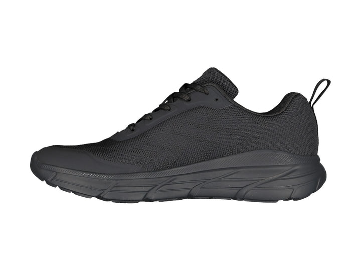 Tenis deportivos Charly en color negro con suela gruesa y parte superior de malla transpirable.