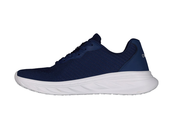 Tenis deportivos Charly en color azul marino con suela blanca y logotipo lateral blanco.