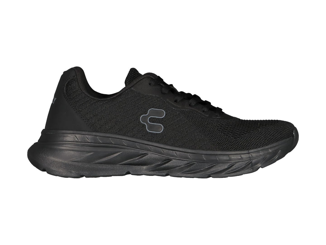 Tenis deportivos Charly color negro con tejido transpirable y suela robusta.