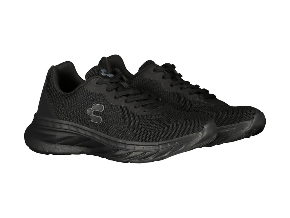 Tenis deportivos Charly color negro con tejido transpirable y suela robusta.