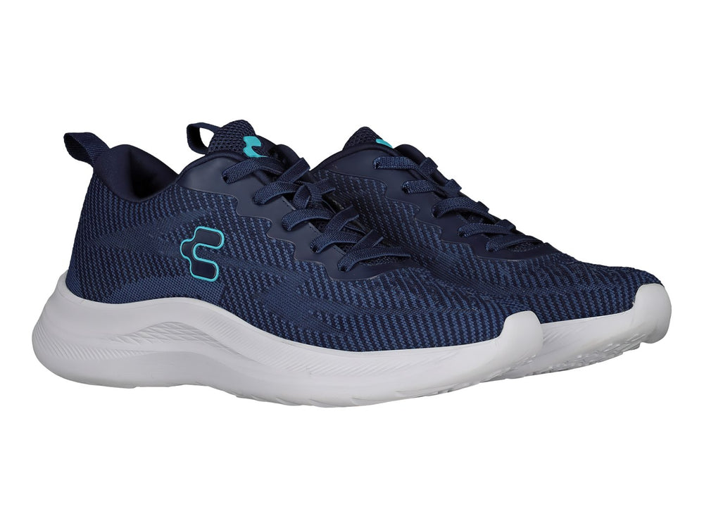 Tenis deportivos Charly color azul marino con suela blanca y logotipo en azul claro.