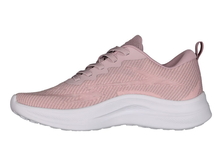 Tenis deportivos Charly en color rosa con suela blanca y tejido transpirable.